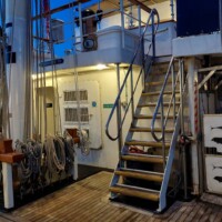 Port wheelchair lift and stairs from main deck to bridge